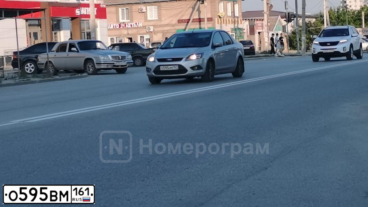 Фото автомобиля PEUGEOT T 308, 2008 — госномер Н950ЕО138. Цвет: ЯРКО-СИНИЙ