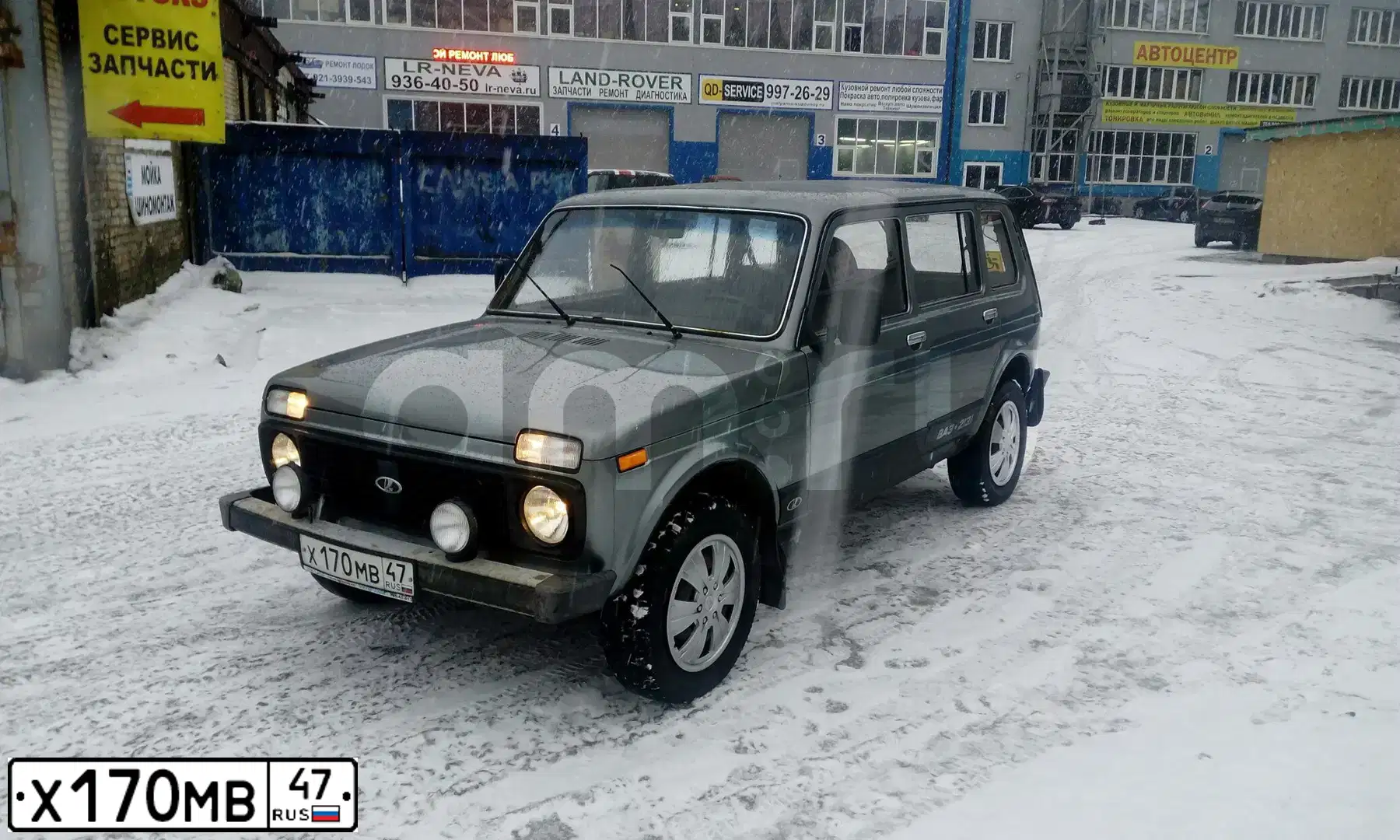 Фото автомобиля LADA 2131 NIVA, 2010 — госномер Х170МВ47. Цвет: СРЕДНИЙ СЕРО-ЗЕЛЕНЫЙ МЕТ.