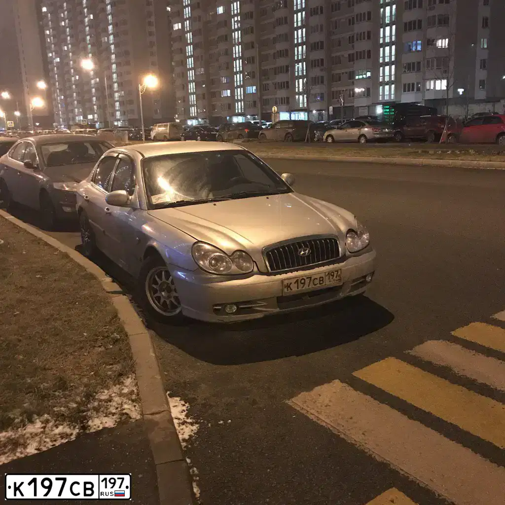 Фото автомобиля FORD D FOCUS, 2009 — госномер Т250УЕ199. Цвет: СЕРЕБРИСТЫЙ