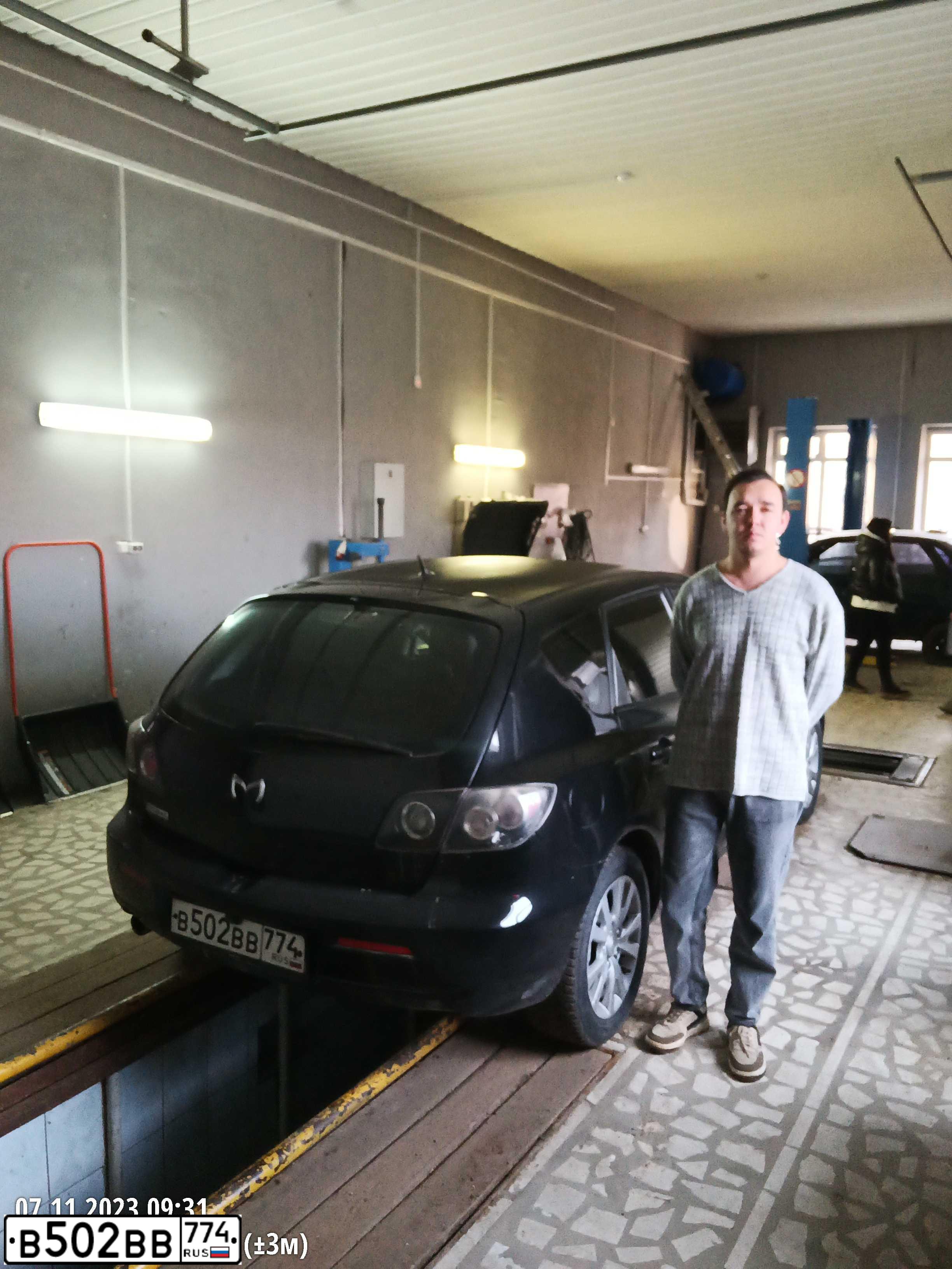 Фото автомобиля MAZDA 3, 2006 — госномер М168ТМ702. Цвет: ЧЕРНЫЙ