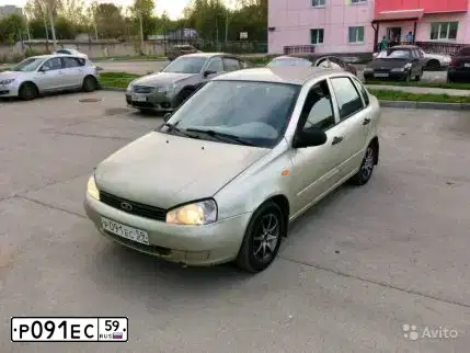 Фото автомобиля LADA 1118 KALINA, 2007 — госномер Р091ЕС59. Цвет: БЕЛО-ЖЕЛТЫЙ ПЕРЛАМУТРОВЫЙ