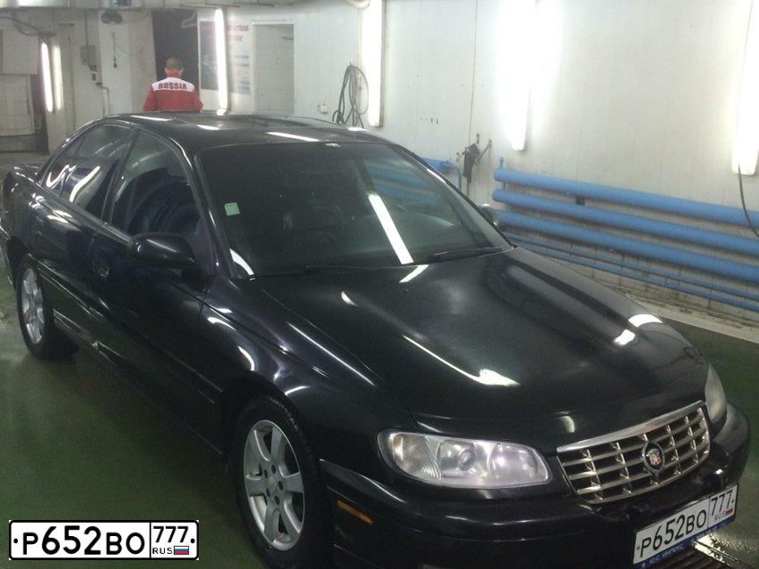 Фото автомобиля CADILLAC CATERA, 1999 — госномер Р652ВО777. Цвет: ЧЕРНЫЙ