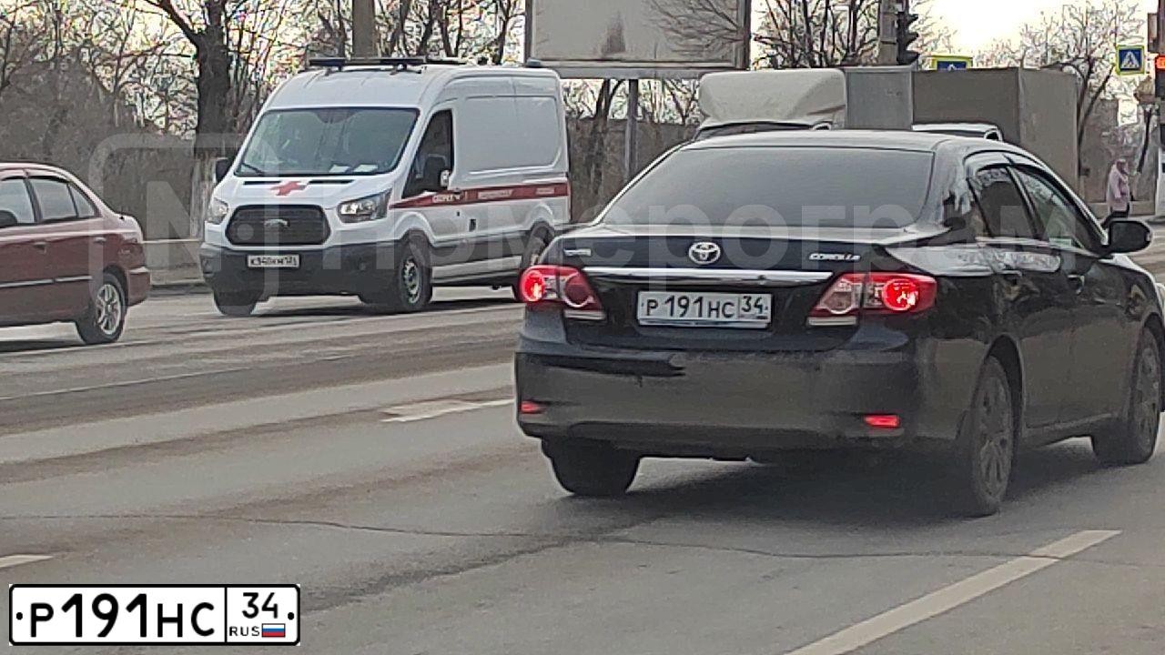 Фото автомобиля TOYOTA COROLLA, 2011 — госномер Р191НС34. Цвет: ЧЕРНЫЙ