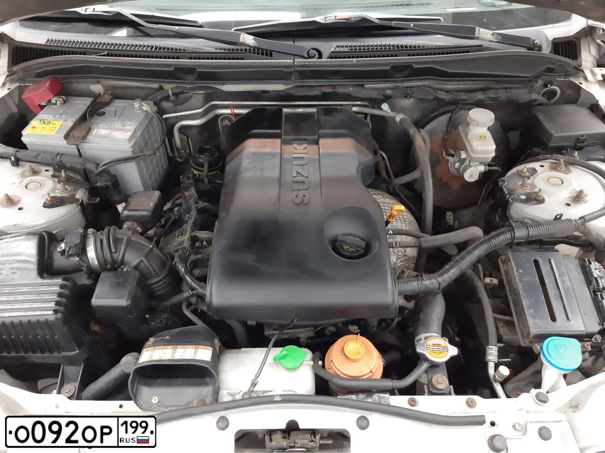 Фото автомобиля SUZUKI /GRAND/ VITARA, 2008 — госномер О092ОР199. Цвет: Серебристый