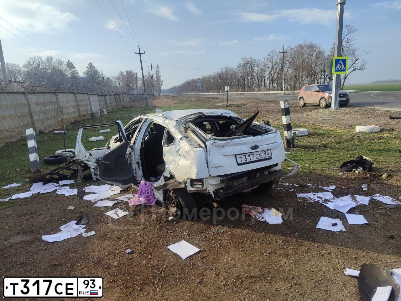 Фото автомобиля FORD FOCUS, 2010 — госномер Т317СЕ93. Цвет: Белый