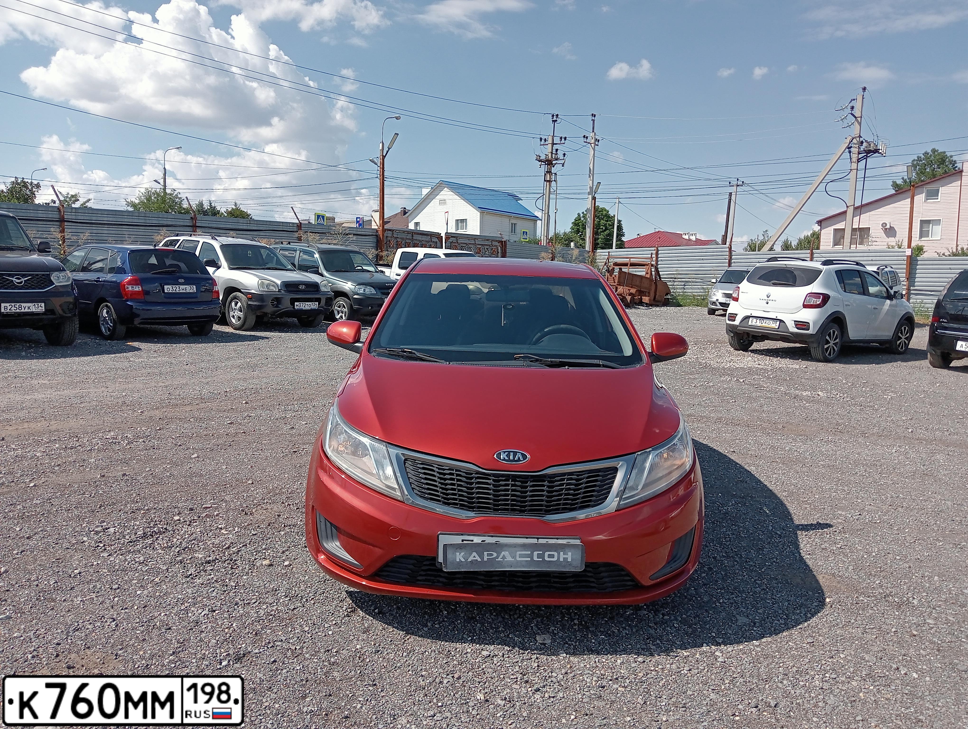 Фото автомобиля KIA RIO, 2012 — госномер К760ММ198. Цвет: Красный