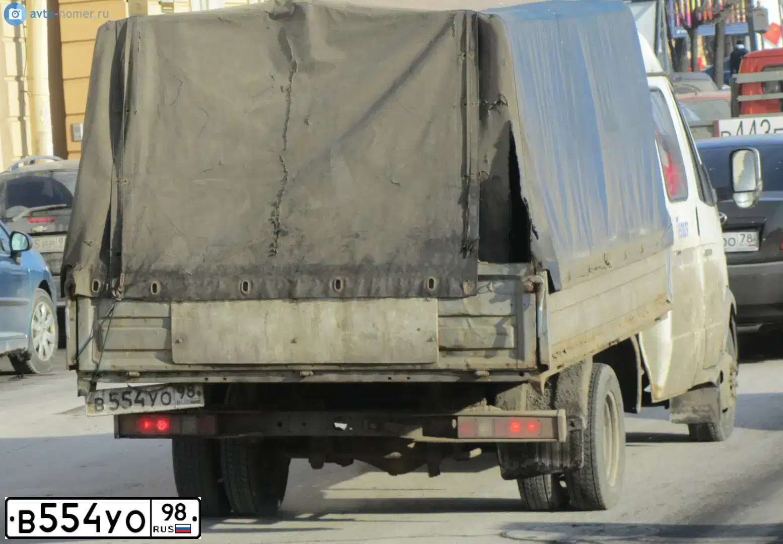 Фото автомобиля GAZ 3302 EL, 2006 — госномер Т423НУ178. Цвет: БЕЛЫЙ