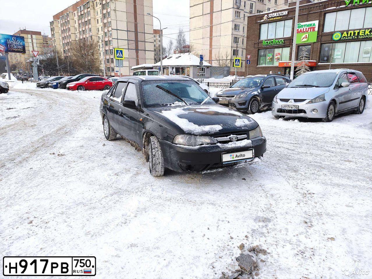 Фото автомобиля MITSUBISHI GRANDIS, 2004 — госномер Е039ОВ156. Цвет: Серый