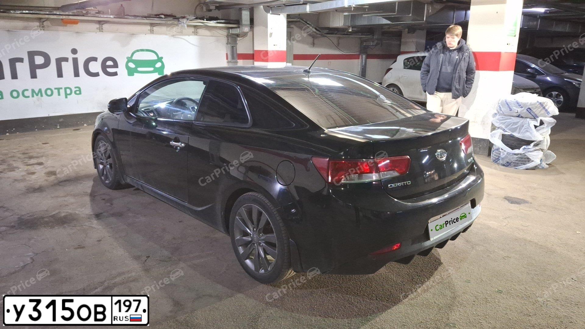 Фото автомобиля KIA CERATO, 2011 — госномер К053УК62. Цвет: ЧЕРНЫЙ