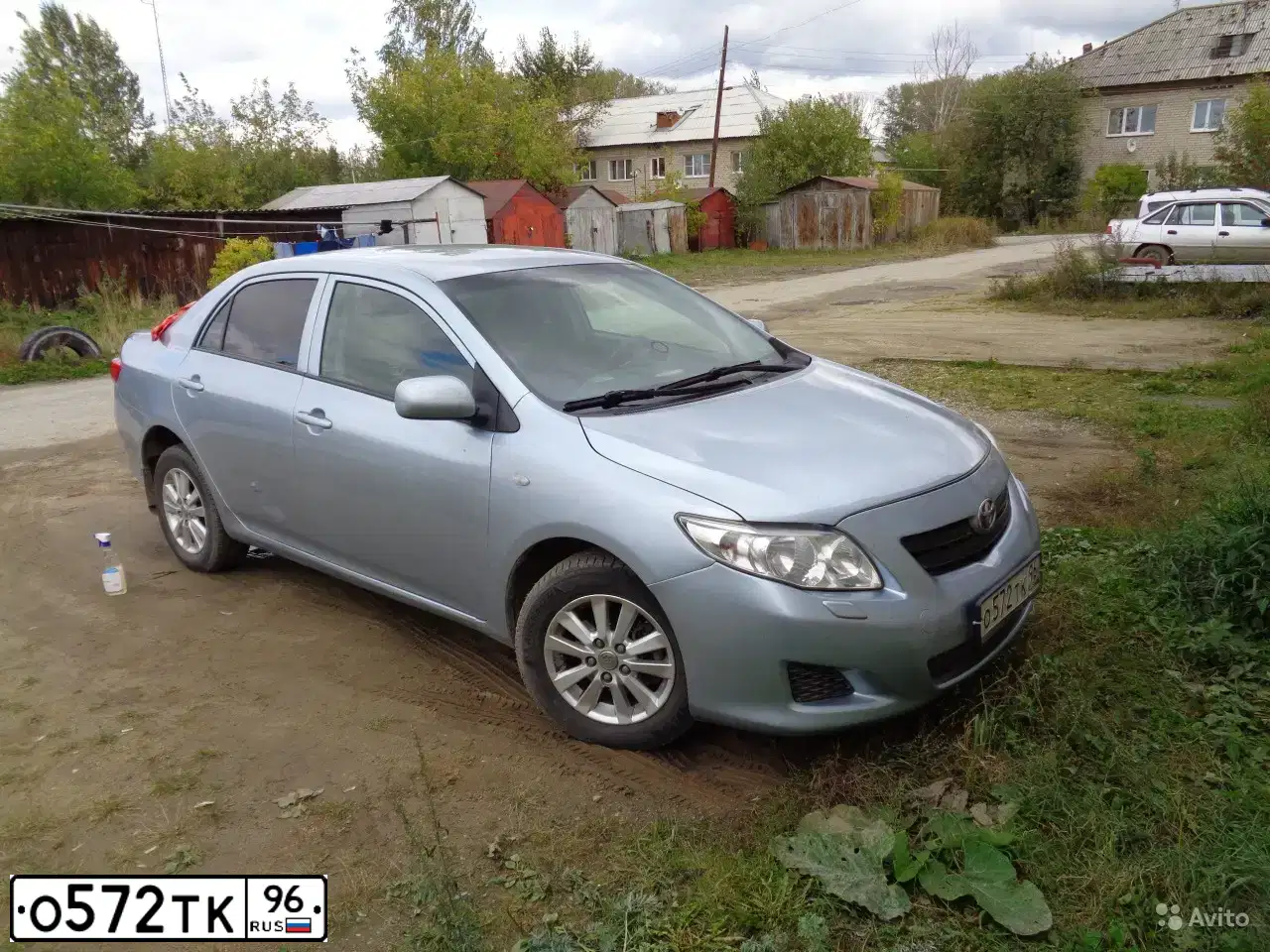 Фото автомобиля TOYOTA COROLLA, 2008 — госномер Е727ВК774. Цвет: СВЕТЛО-ГОЛУБОЙ