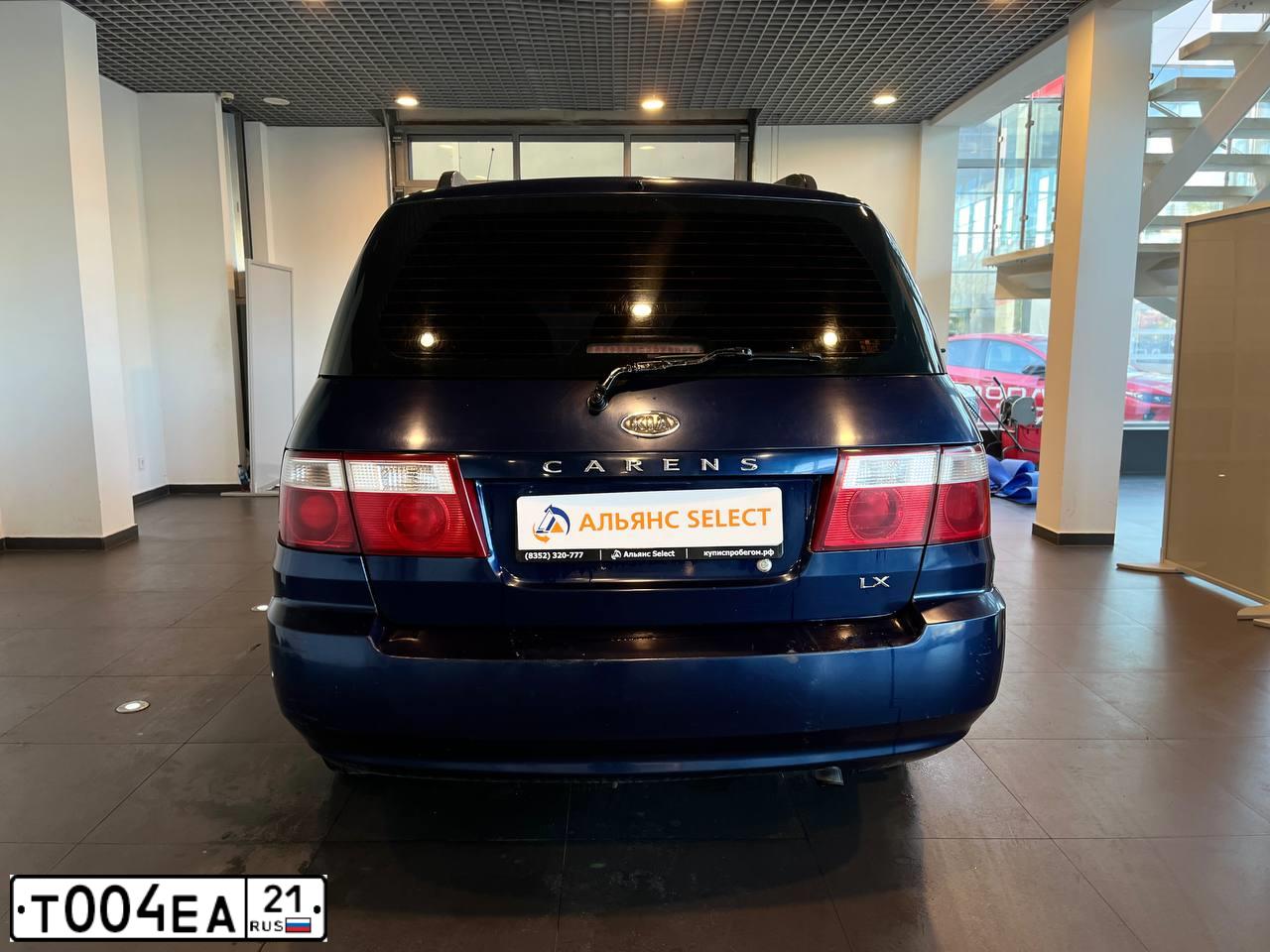 Фото автомобиля KIA CARENS, 2006 — госномер Т004ЕА21. Цвет: ТЕМНО-СИНИЙ