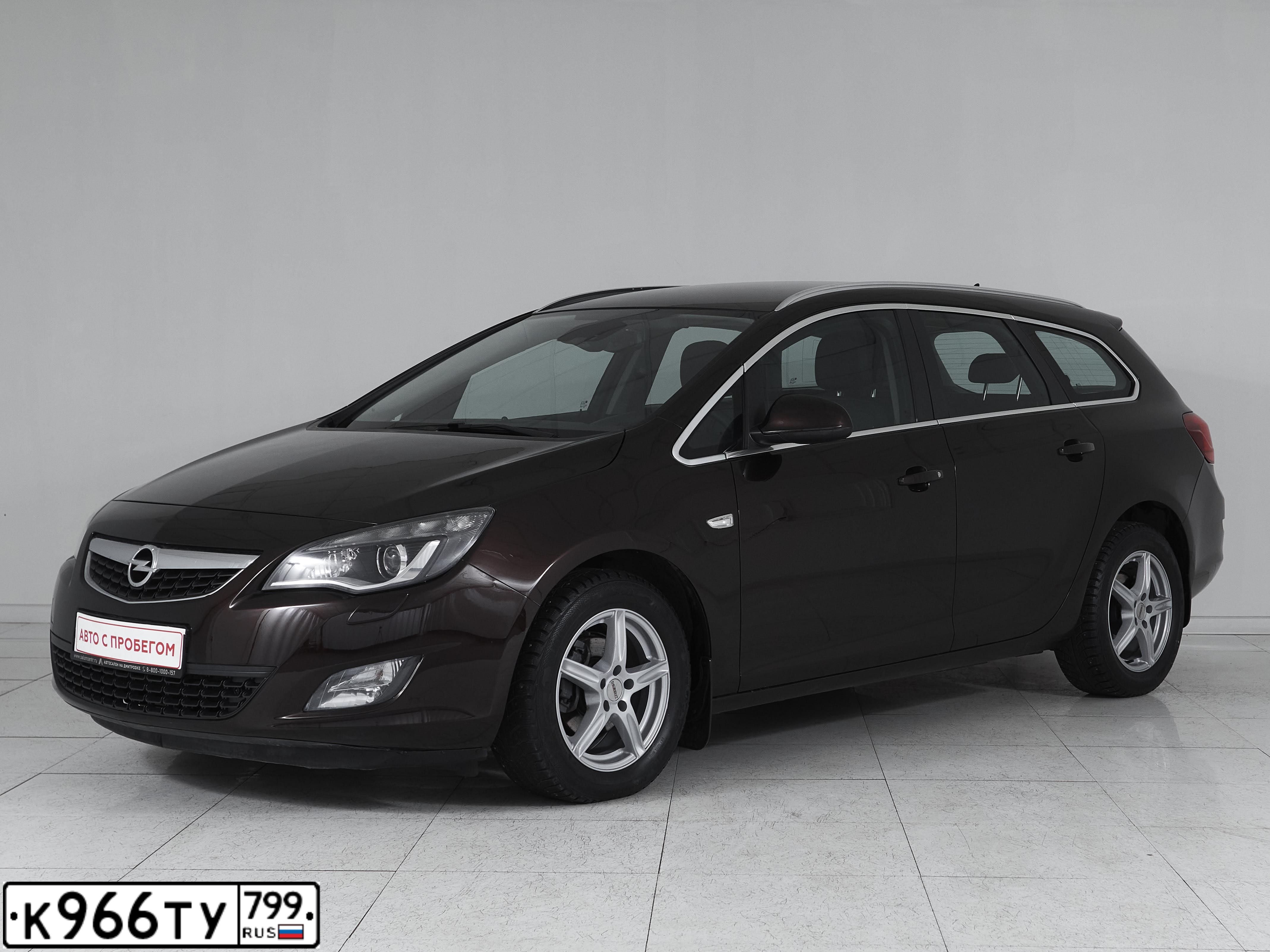 Фото автомобиля OPEL ASTRA, 2012 — госномер Р699АЕ550. Цвет: Коричневый