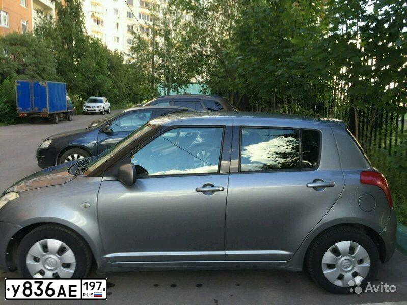 Фото автомобиля SUZUKI SWIFT, 2005 — госномер Е267ОЕ82. Цвет: Серый