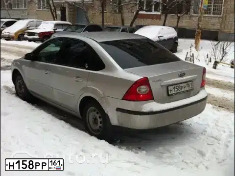 Фото автомобиля FORD FOCUS, 2006 — госномер Н158РР161. Цвет: СЕРЕБРИСТЫЙ