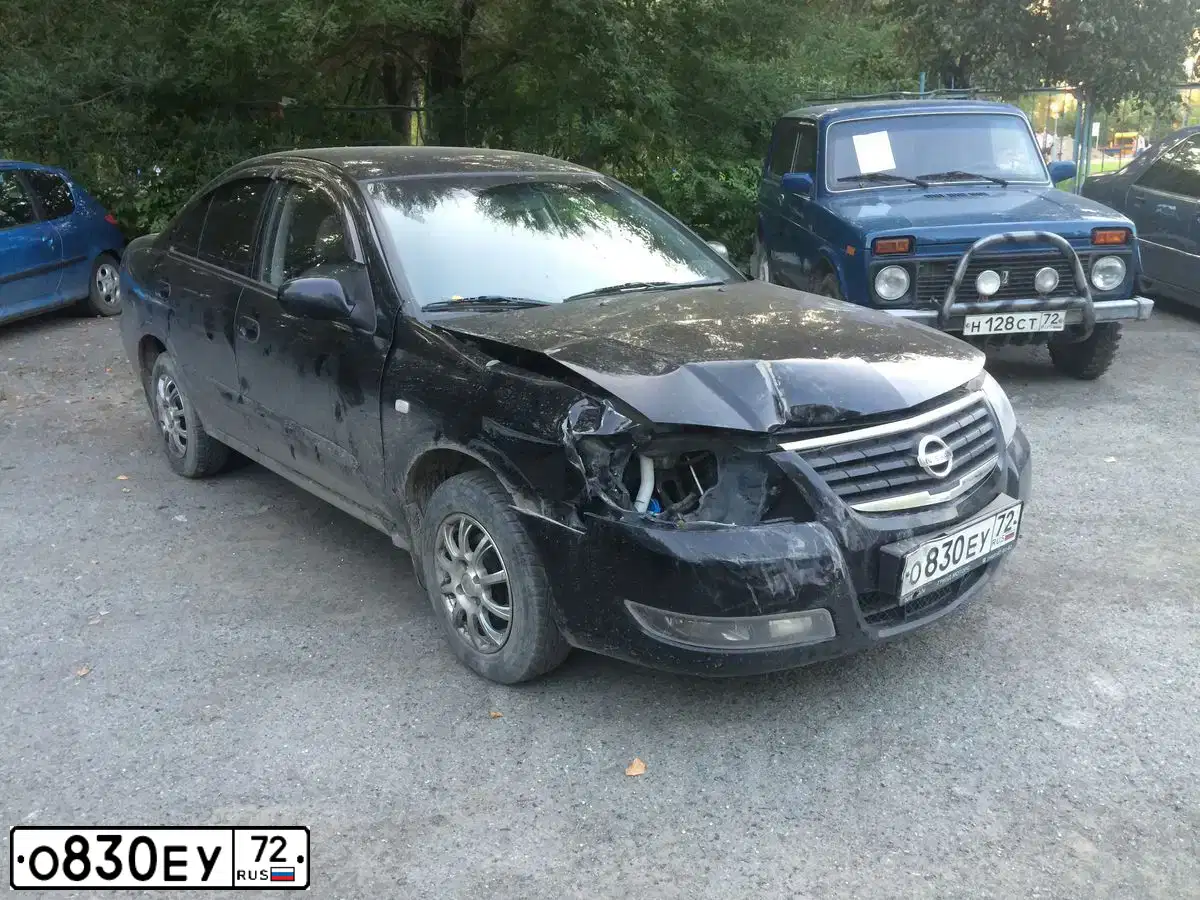 Фото автомобиля NISSAN ALMERA, 2012 — госномер Е499СХ196. Цвет: ЧЕРНЫЙ
