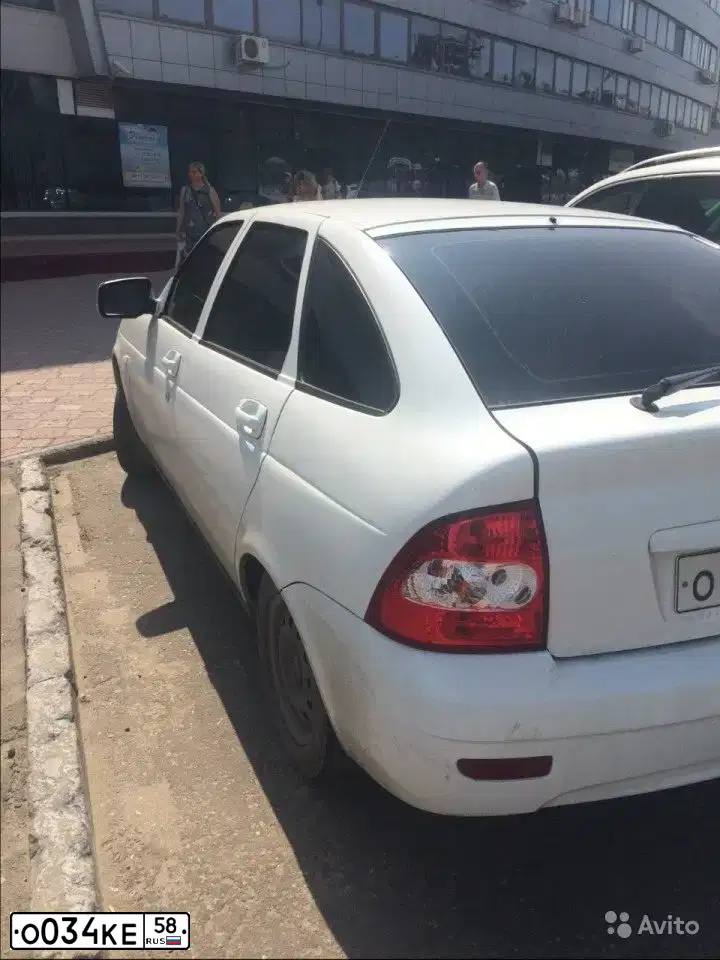 Фото автомобиля LADA 2172 PRIORA, 2012 — госномер О034КЕ58. Цвет: Белый