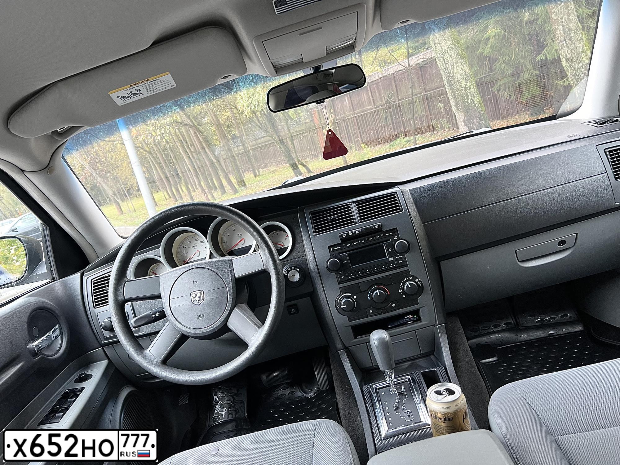 Фото автомобиля DODGE MAGNUM, 2004 — госномер Х652НО777. Цвет: ЧЕРНЫЙ