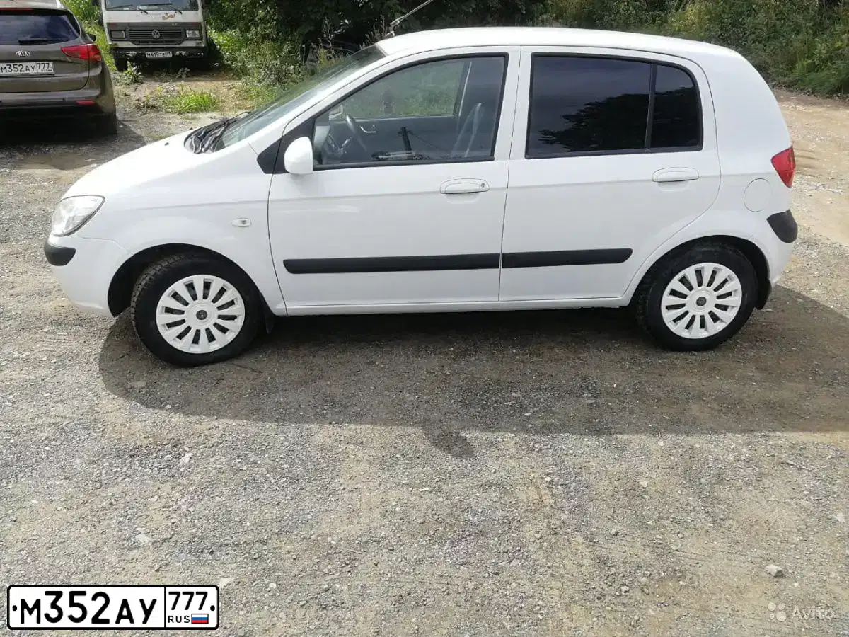 Фото автомобиля KIA CEE'D, 2013 — госномер М352АУ777. Цвет: Коричневый