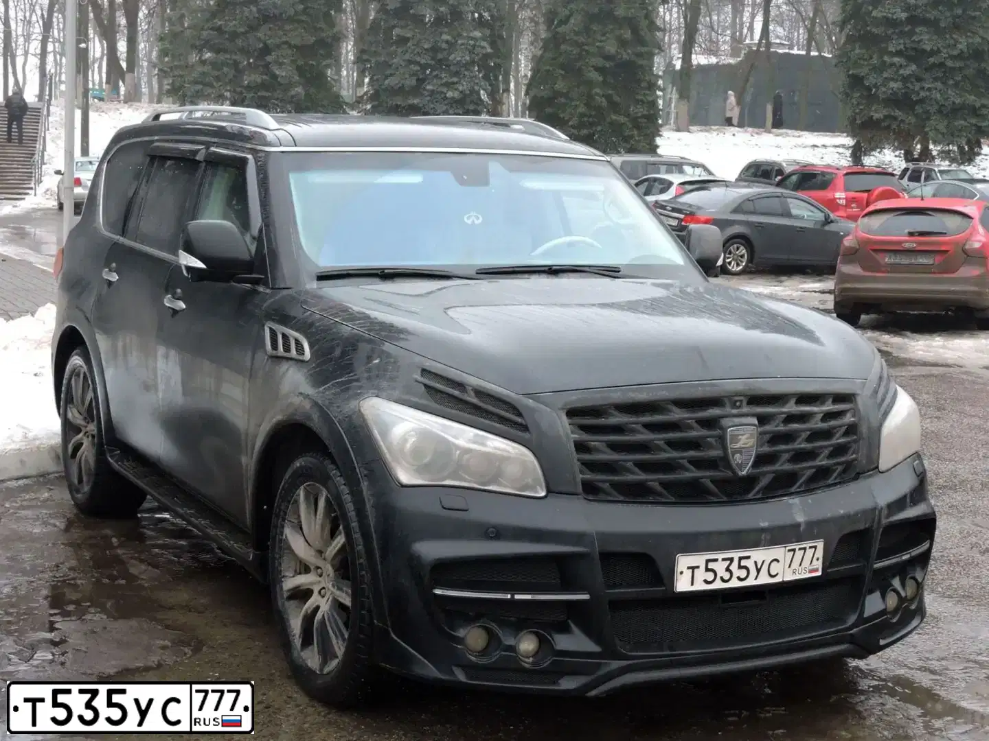 Фото автомобиля INFINITI QX80 /QX56/, 2010 — госномер Р008ММ16. Цвет: ЧЕРНЫЙ