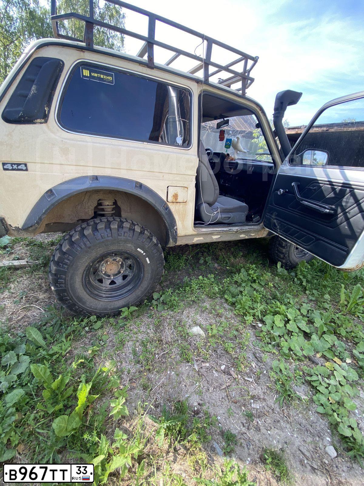 Фото автомобиля LADA 2121 NIVA, 1997 — госномер В967ТТ33. Цвет: СВЕТЛО-БЕЖЕВЫЙ