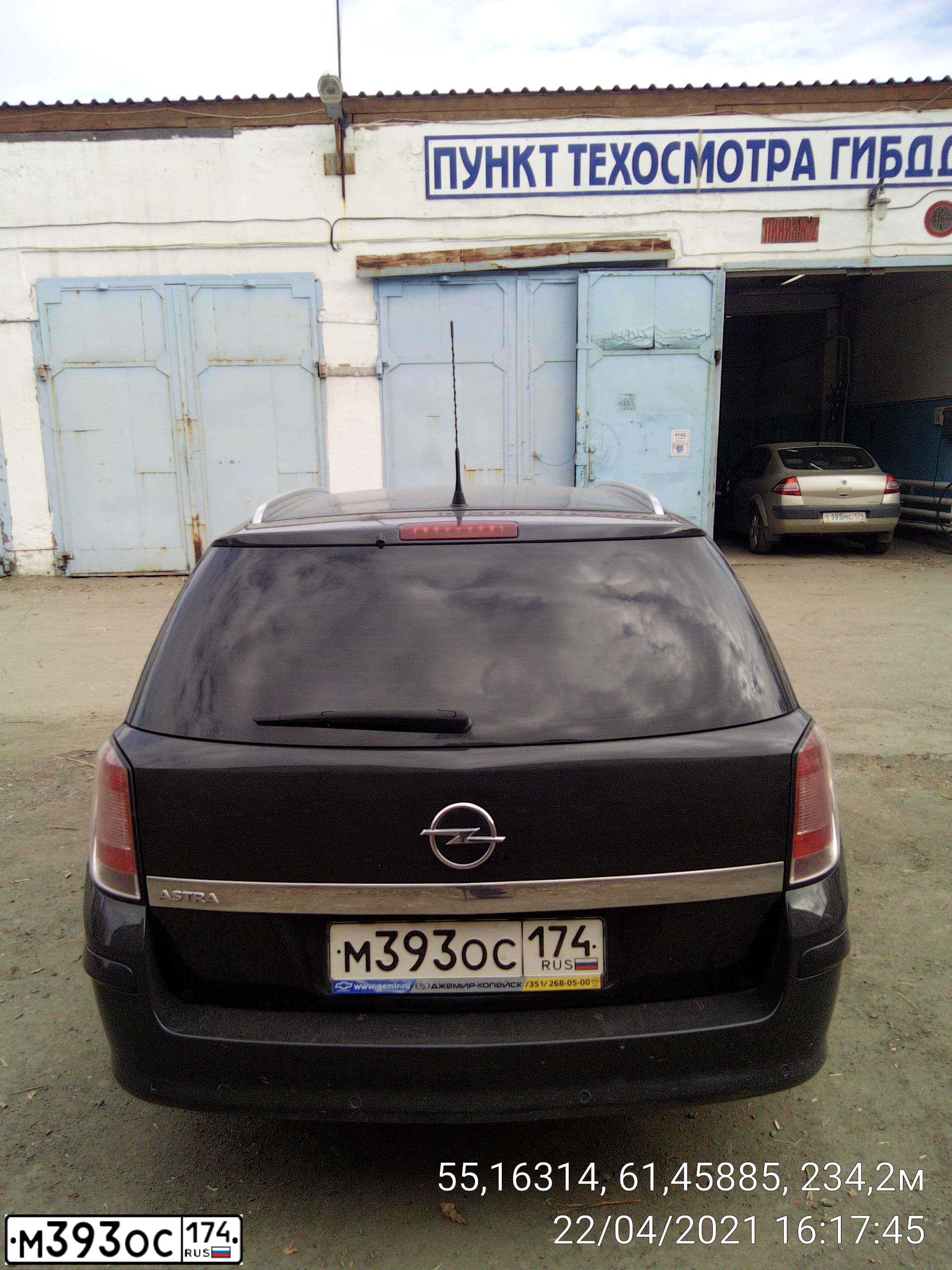 Фото автомобиля OPEL ASTRA, 2011 — госномер М482КУ774. Цвет: ЧЕРНЫЙ