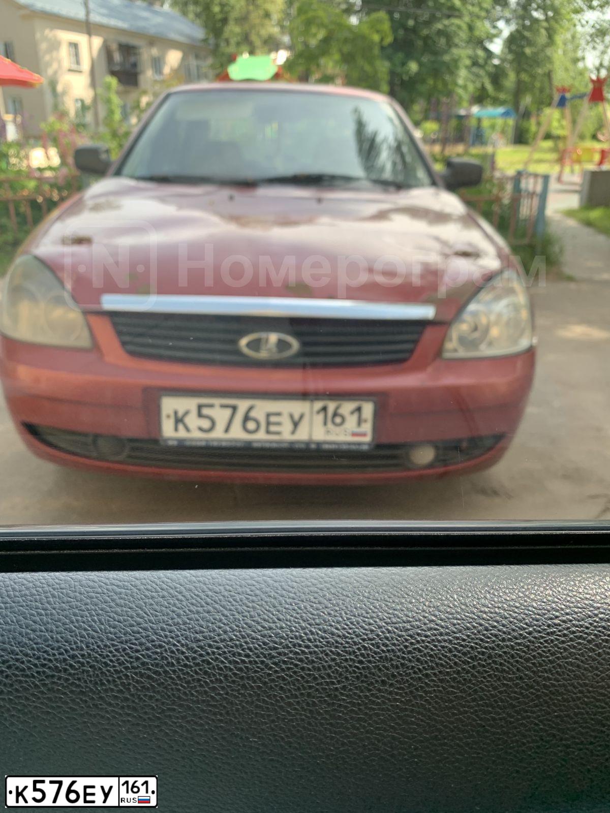 Фото автомобиля LADA 2170 PRIORA, 2009 — госномер Н609МО761. Цвет: ЗОЛОТИСТО-КРАСНЫЙ