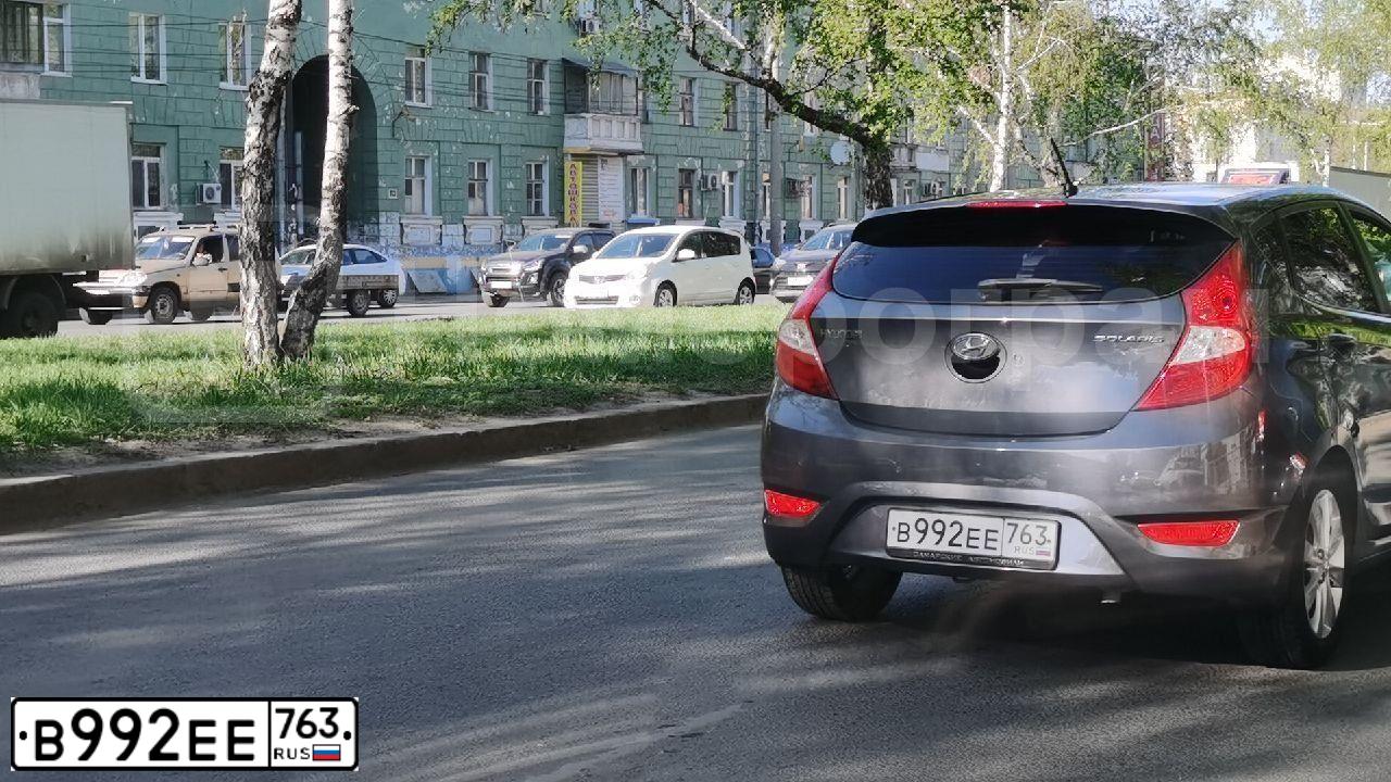 Фото автомобиля HYUNDAI SOLARIS, 2012 — госномер Н521ТК73. Цвет: ЧЕРНО-СЕРЫЙ