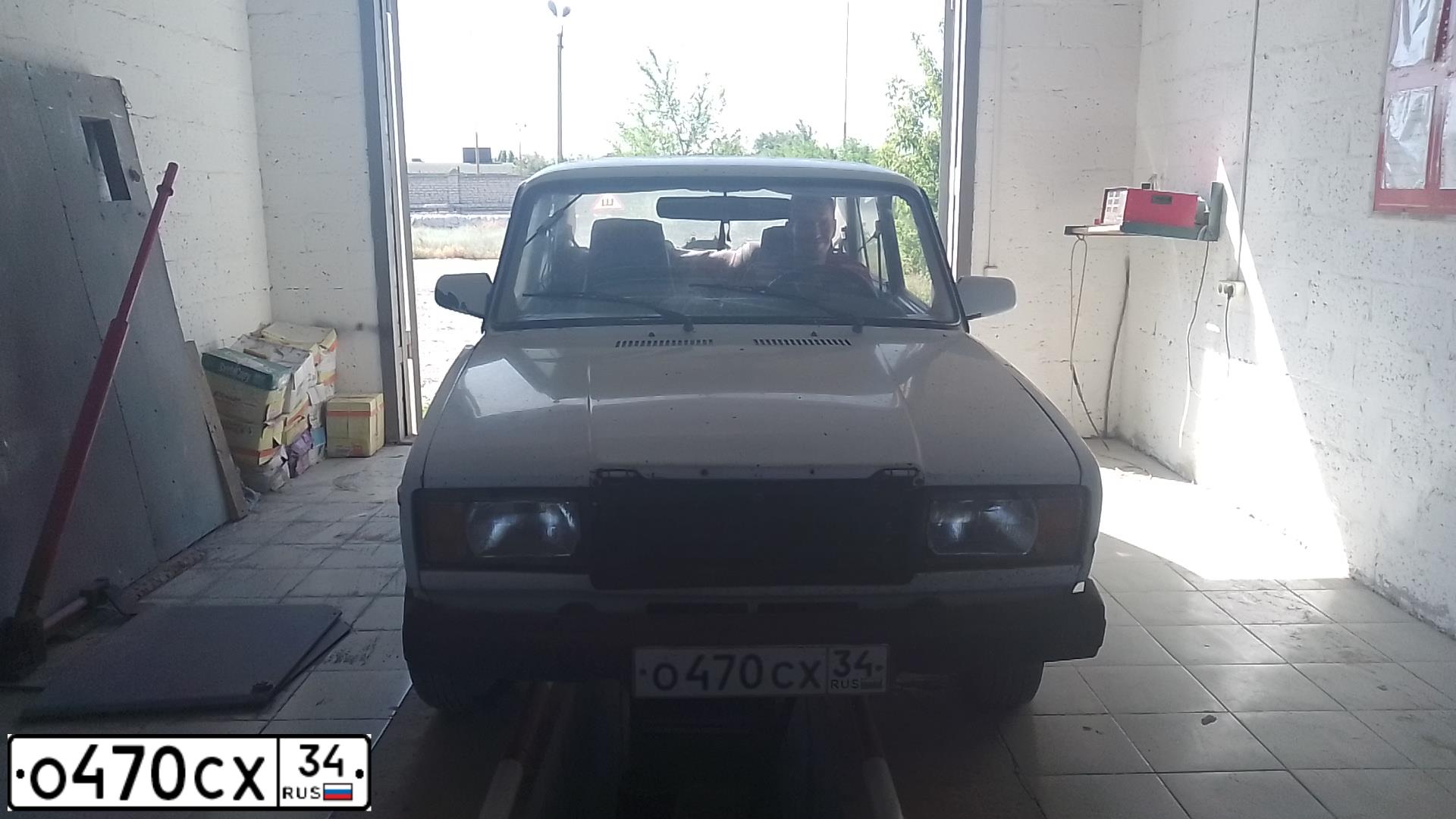 Фото автомобиля LADA 2107, 2004 — госномер О470СХ34. Цвет: БЕЛЫЙ