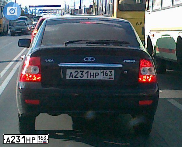 Фото автомобиля LADA 2172 PRIORA, 2009 — госномер Т520ХА64. Цвет: СИНЕ-ЧЕРНЫЙ