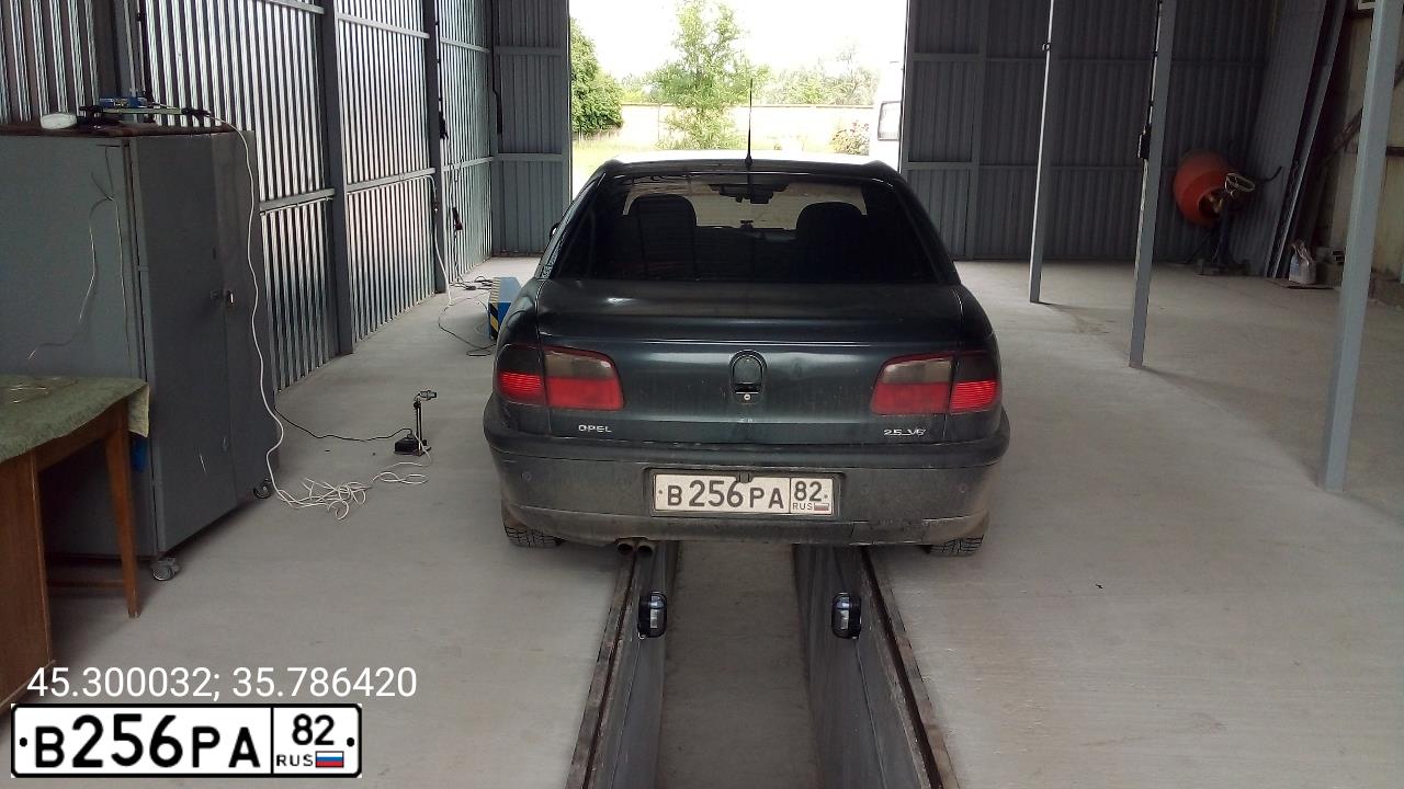 Фото автомобиля OPEL OMEGA, 1998 — госномер К727ОА71. Цвет: ЧЕРНЫЙ
