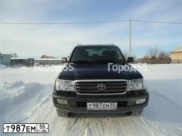 Фото автомобиля TOYOTA LANDCRUISER, 2004 — госномер Т987ЕМ55. Цвет: ЧЕРНЫЙ