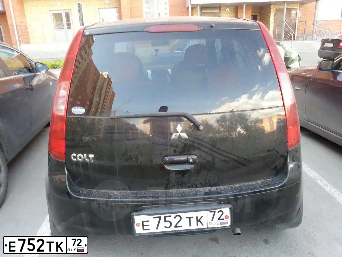 Фото автомобиля MITSUBISHI COLT, 2003 — госномер Х305КР55