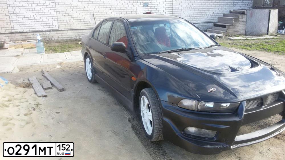 Фото автомобиля MITSUBISHI LANCER, 2008 — госномер О291МТ152. Цвет: ЧЕРНЫЙ