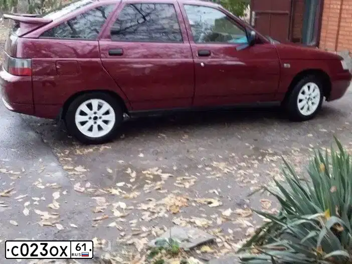 Фото автомобиля LADA 2112 LADA, 2004 — госномер О313ТХ161. Цвет: ТЕМНО-МАЛИНОВЫЙ