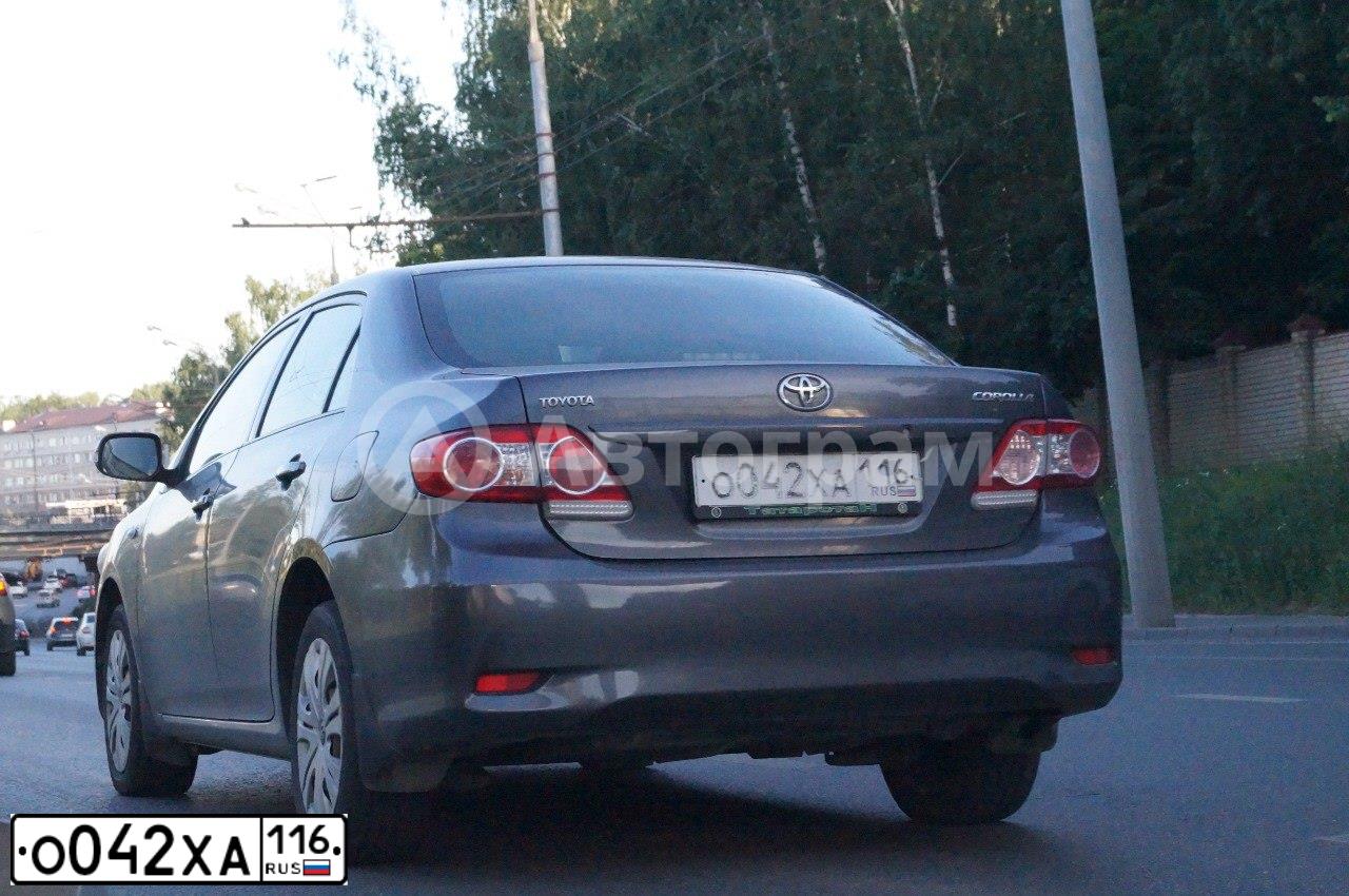 Фото автомобиля TOYOTA COROLLA, 2011 — госномер О042ХА116. Цвет: СЕРЫЙ