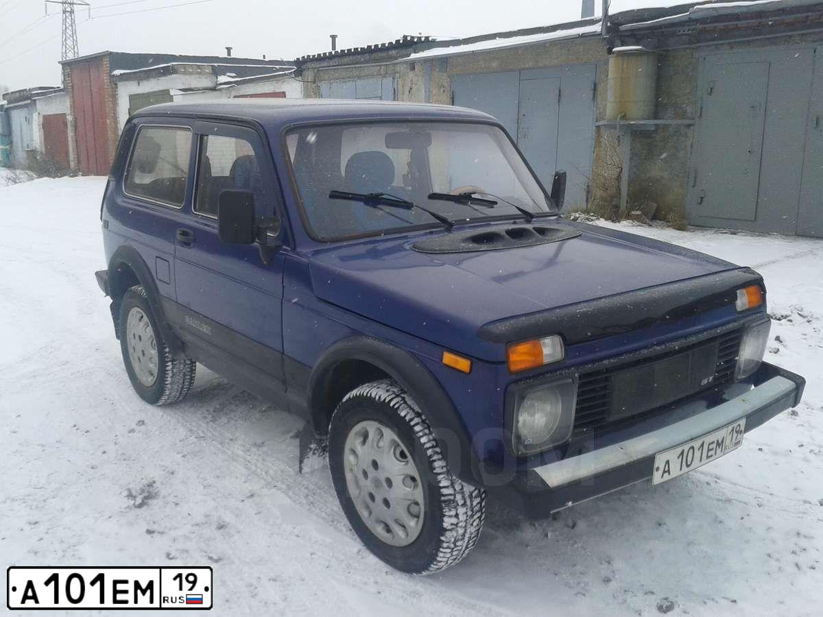 Фото автомобиля LADA 2121 NIVA, 1999 — госномер О464РВ124. Цвет: синий