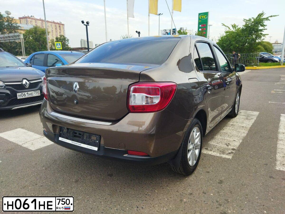 Фото автомобиля RENAULT SANDERO, 2016 — госномер Е754НР76. Цвет: ЧЕРНЫЙ