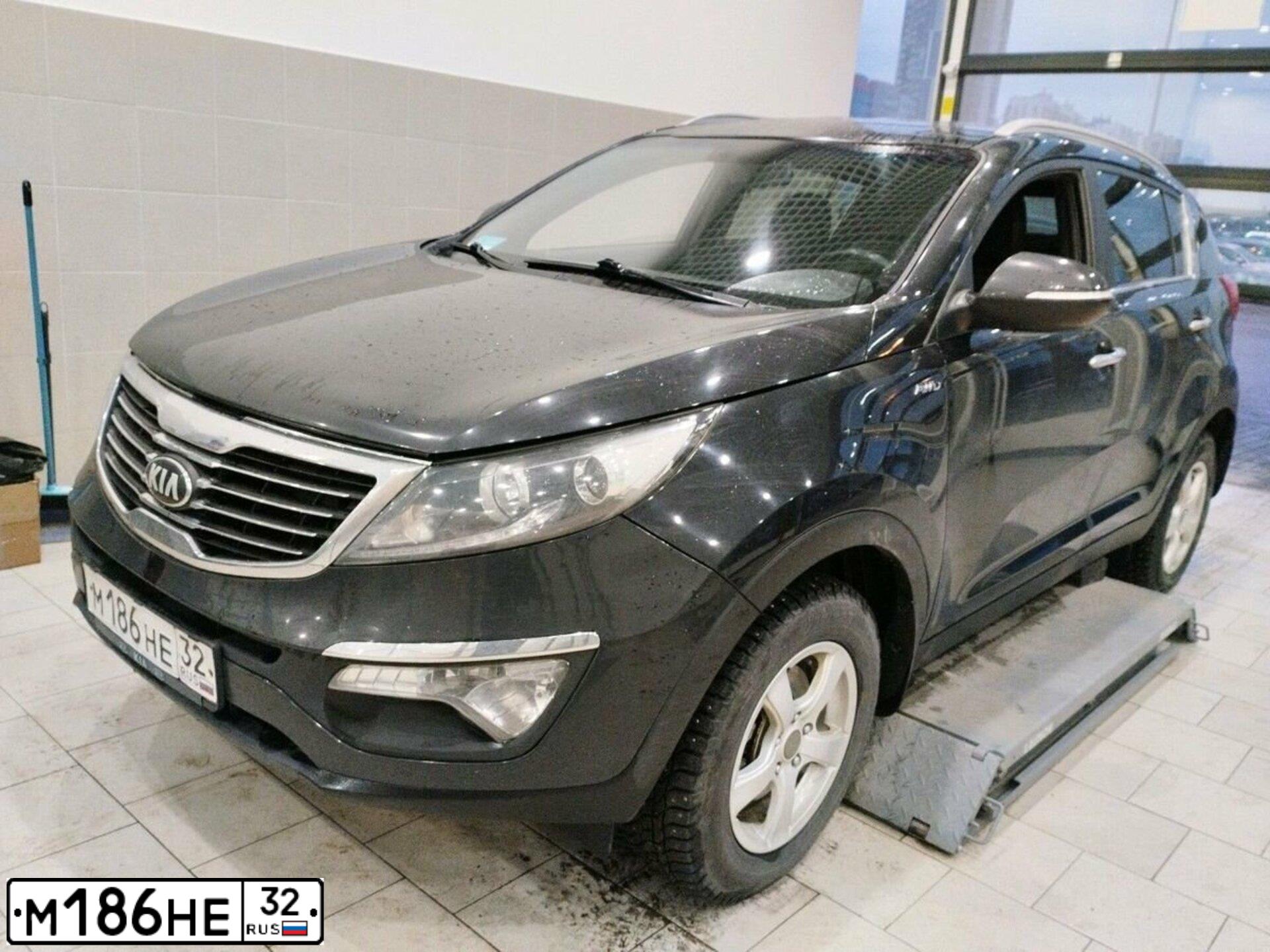Фото автомобиля KIA SPORTAGE, 2012 — госномер К752ОС147. Цвет: ЧЕРНЫЙ ПЕРЛАМУТР