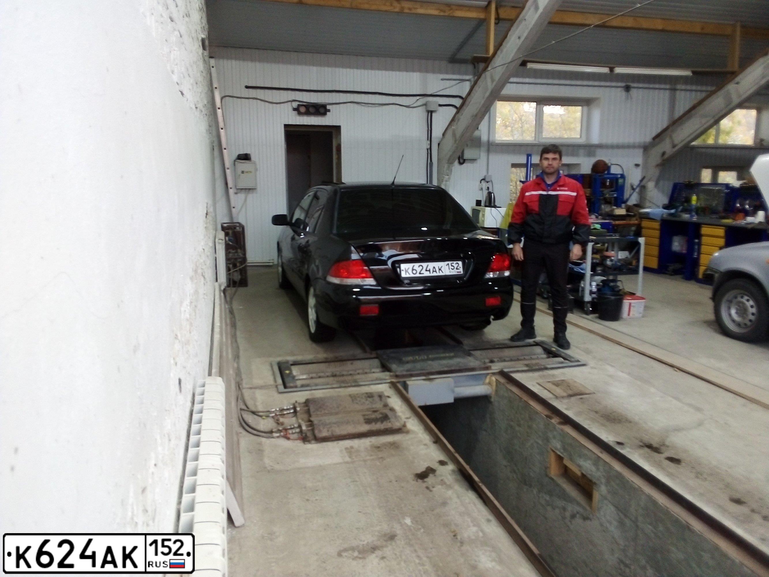 Фото автомобиля MITSUBISHI LANCER, 2005 — госномер С477СЕ58. Цвет: ЧЕРНЫЙ