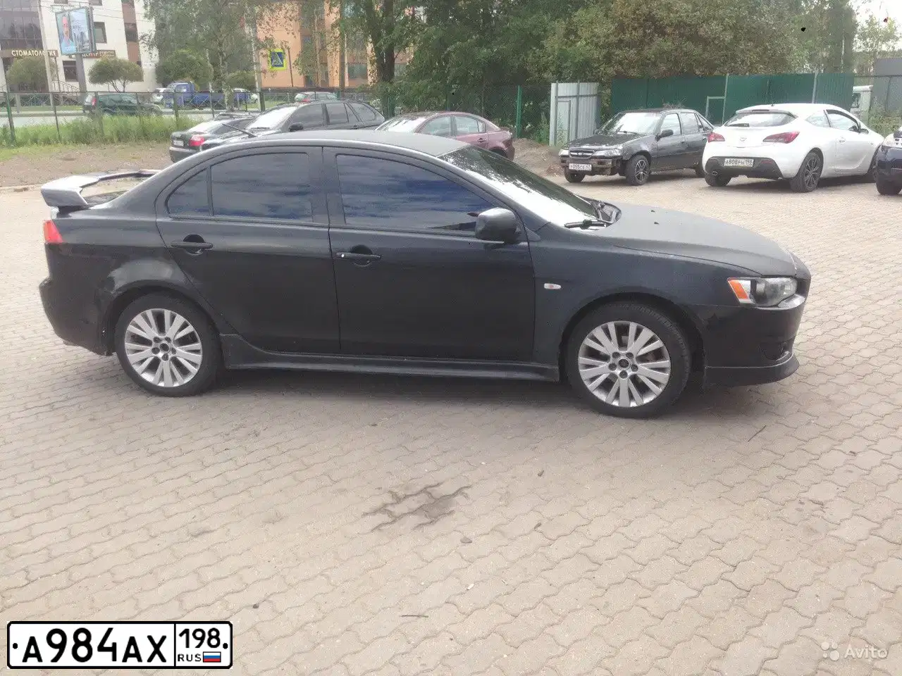 Фото автомобиля MITSUBISHI LANCER, 2008 — госномер К087РН799. Цвет: ЧЕРНЫЙ