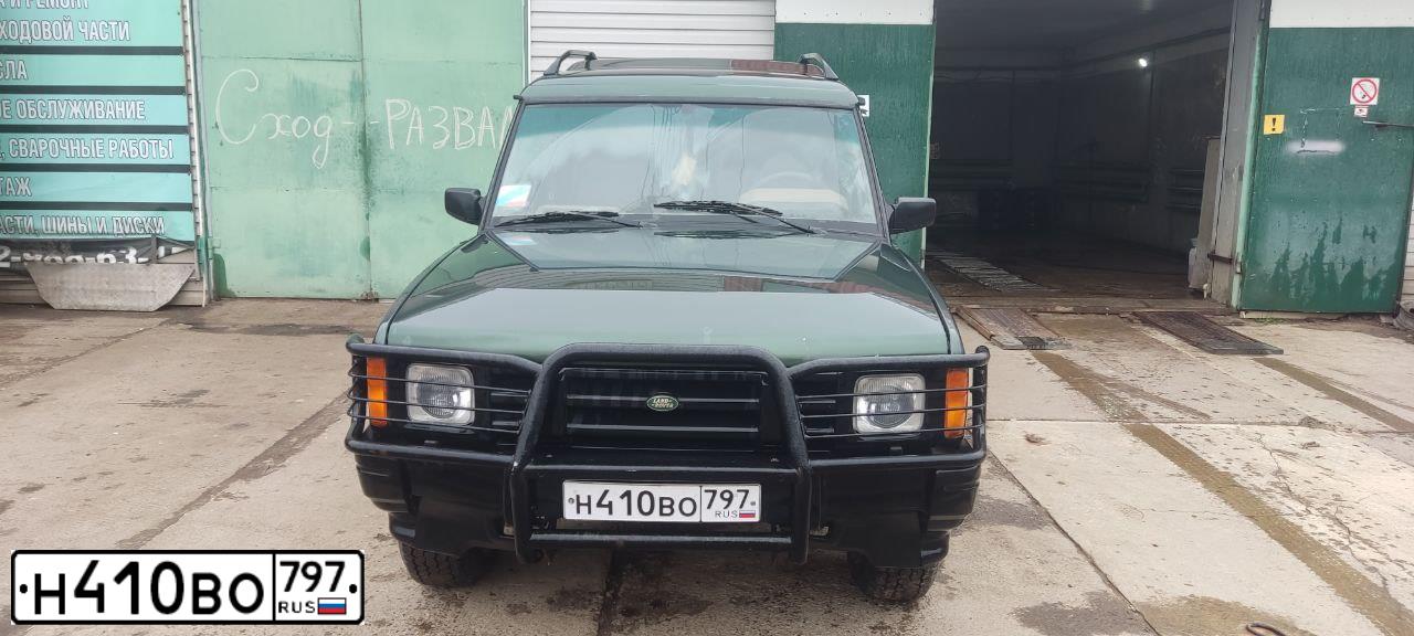 Фото автомобиля LANDROVER DISCOVERY, 1994 — госномер Т999ОВ99. Цвет: ЗЕЛЕНЫЙ