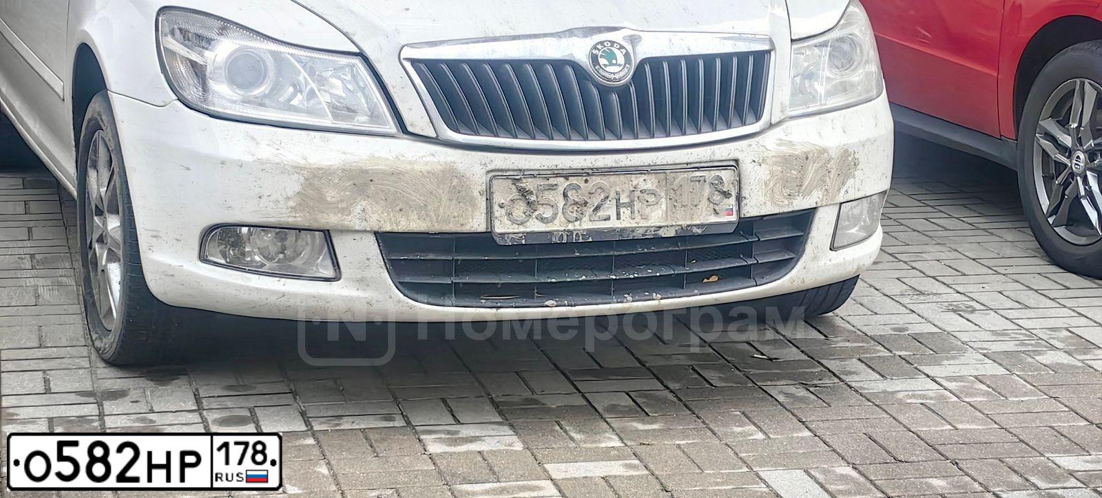 Фото автомобиля SKODA OCTAVIA, 2013 — госномер О582НР178. Цвет: БЕЛЫЙ
