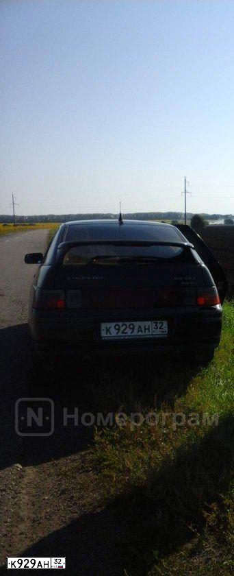 Фото автомобиля LADA 2112, 2003 — госномер Р248СУ55. Цвет: СЕРЕБРИСТЫЙ