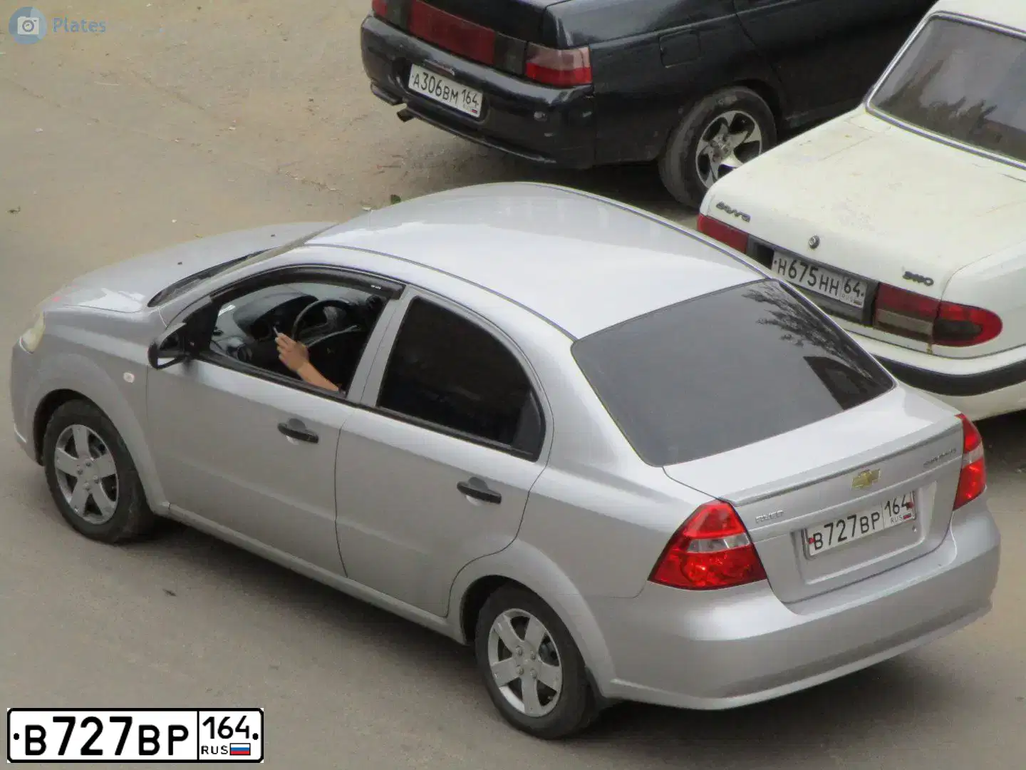 Фото автомобиля OPEL ASTRA, 2012 — госномер Х327ХА64. Цвет: ЧЕРНЫЙ