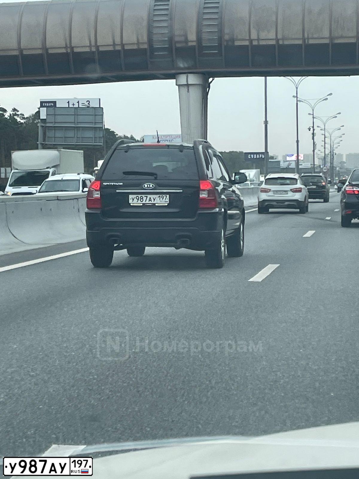 Фото автомобиля KIA SPORTAGE, 2010 — госномер У987АУ197. Цвет: ЧЕРНЫЙ МЕТАЛЛИК