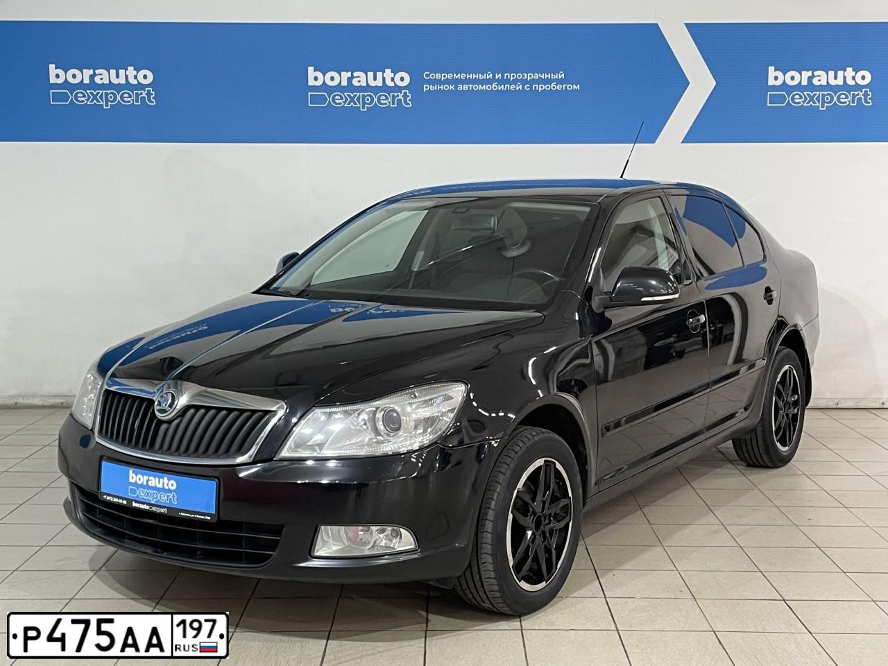 Фото автомобиля SKODA OCTAVIA, 2010 — госномер К559ЕХ136. Цвет: ЧЕРНЫЙ