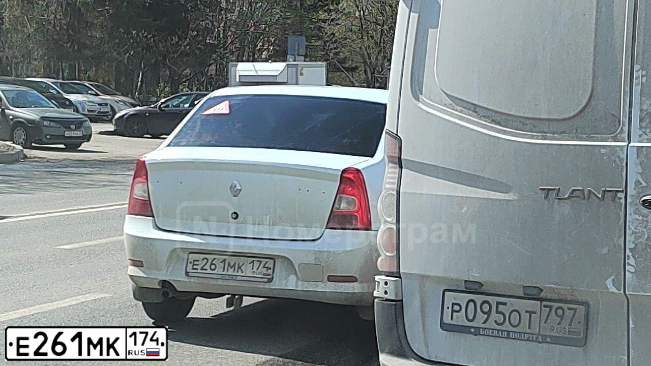 Фото автомобиля RENAULT LOGAN, 2010 — госномер Е261МК174. Цвет: БЕЛЫЙ
