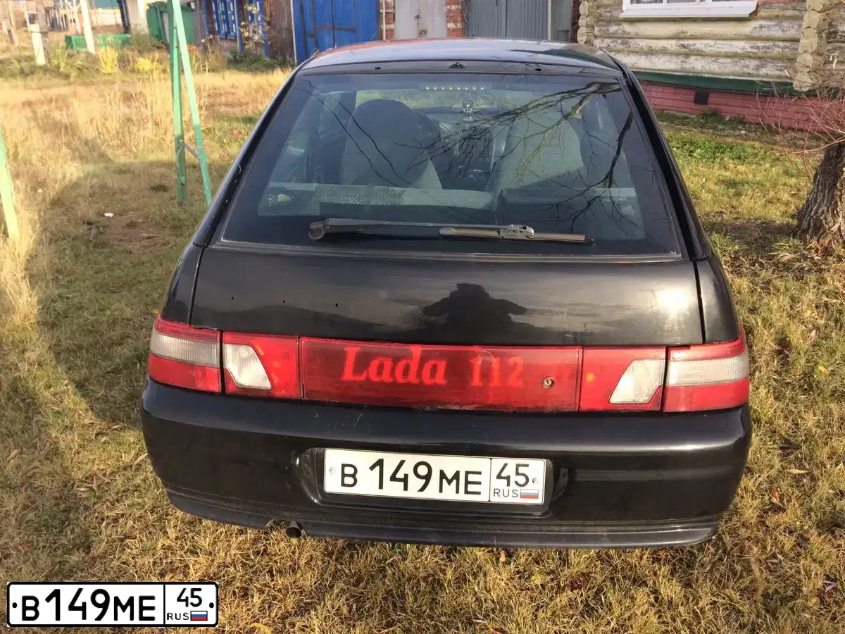 Фото автомобиля LADA 2112 LADA, 2008 — госномер М564МР45. Цвет: ЧЕРНЫЙ