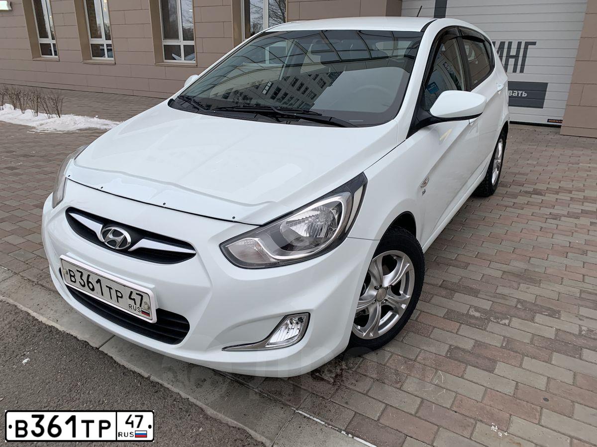 Фото автомобиля HYUNDAI SOLARIS, 2013 — госномер Е870ММ19. Цвет: Белый