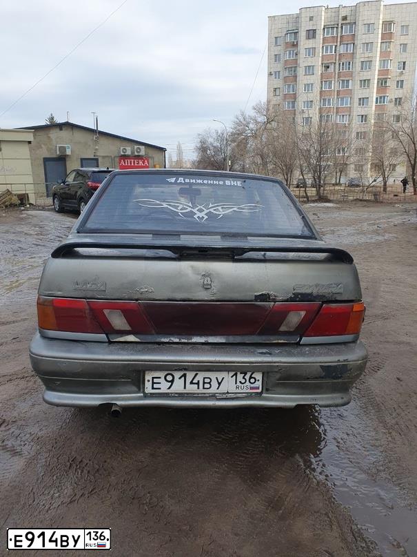 Фото автомобиля LADA 2115 SAMARA, 2001 — госномер Е914ВУ136. Цвет: СЕРЕБРИСТЫЙ СЕРО-ЗЕЛЕНЫЙ